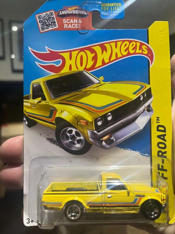 Hot wheels scarce !! Yellow Datsun long card