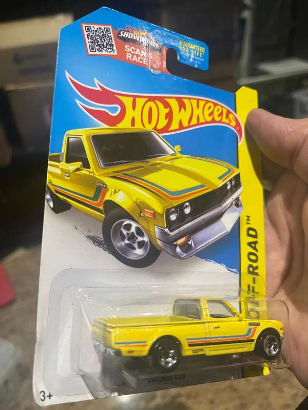 Hot wheels scarce !! Yellow Datsun long card