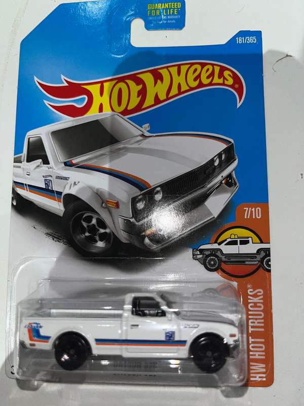 Hot wheels Datsun 620 long car import.  White