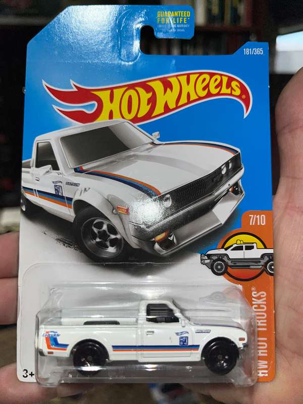 Hot wheels Datsun 620 long car import.  White