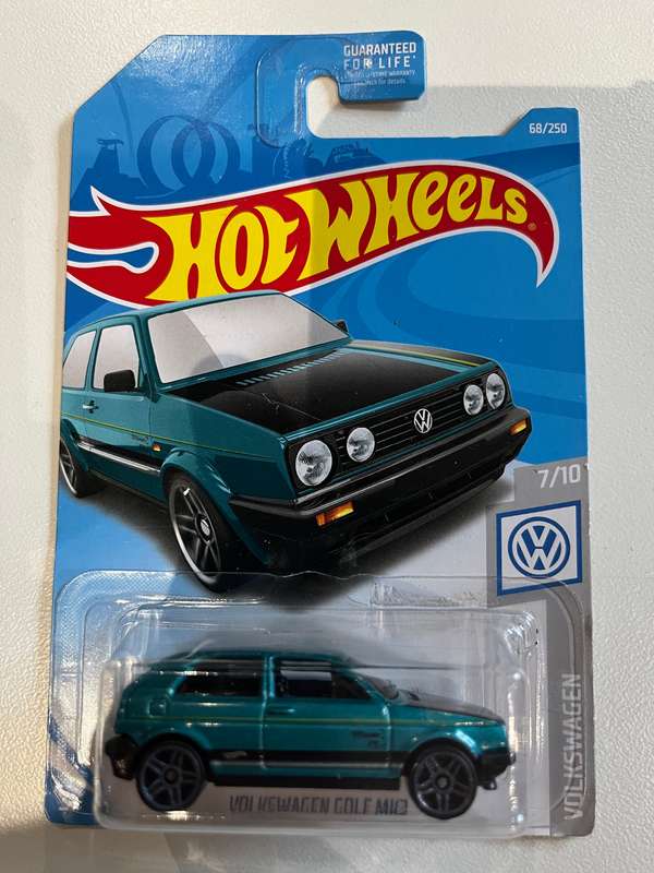 Hot wheels Volkswagen Golf turquoise.  Long card import