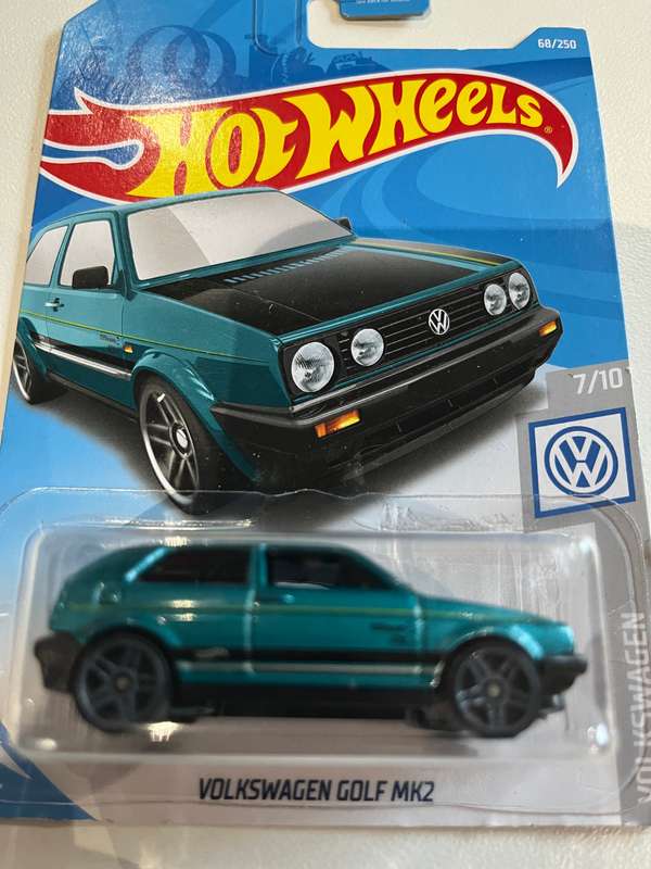 Hot wheels Volkswagen Golf turquoise.  Long card import