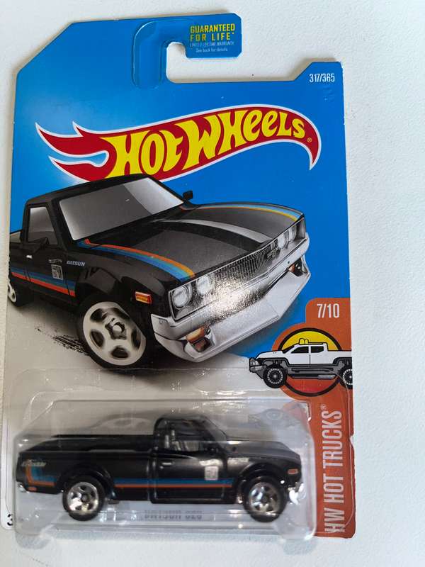 Hot wheels long card import Datsun 620. Black