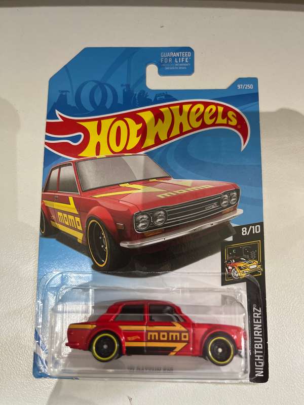 Hot wheels Datsun Bluebird Momo red.  Long card import