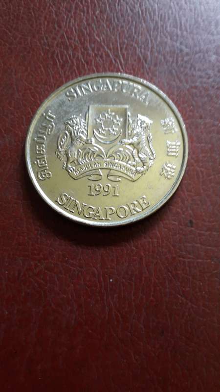 Singapore 10 Dollars 1991  (year of the goat) (diameter 40 mm)