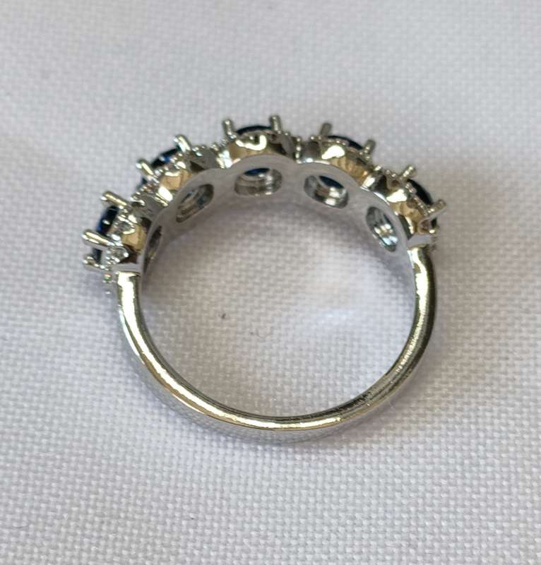 Gorgeous ring with Lab created Blue and White CZ stones: Size US7