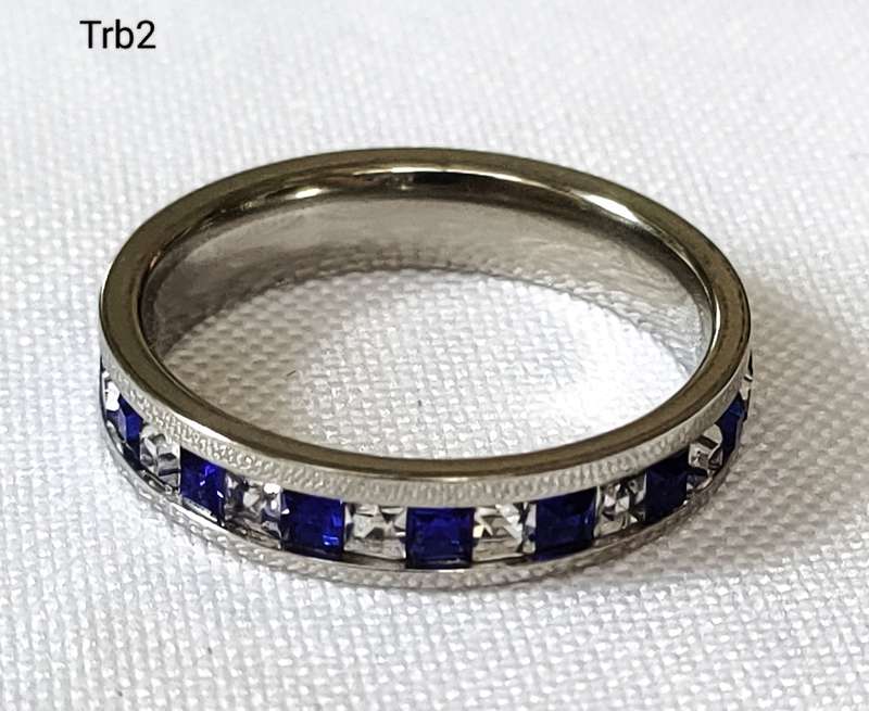 Dress ring -lab created blue and white stones- entire circumference of ring covered - size US 7