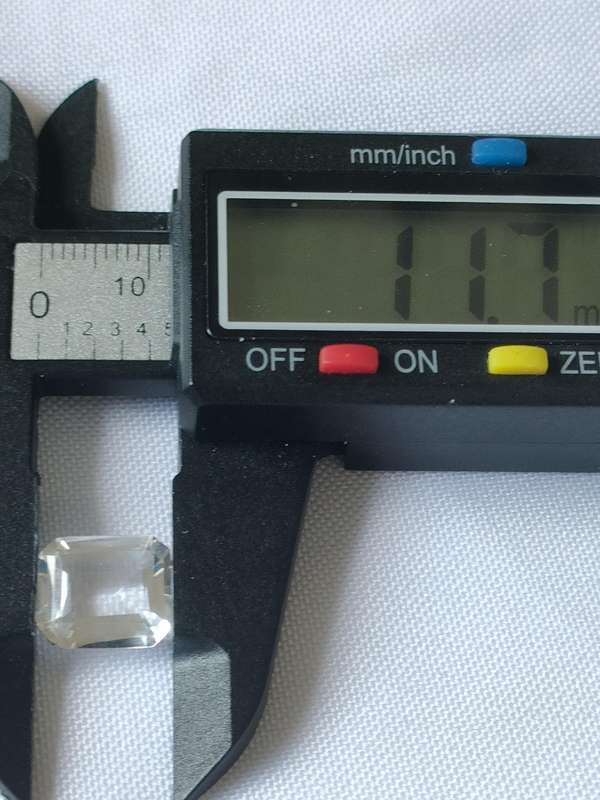 Large White Topaz- 11.7 mm -naturally mined - emerald cut - certification available