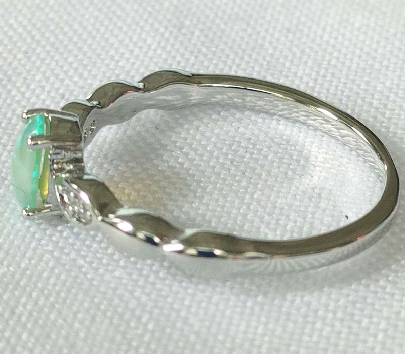 Opal ring -lab created Opal and clear stones- size US7