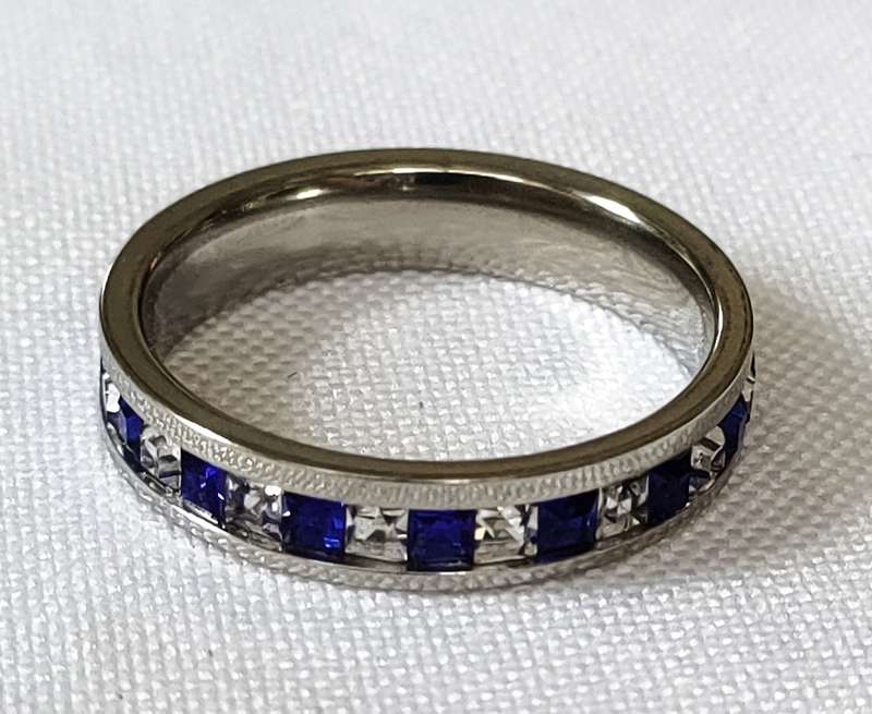 Dress ring -lab created blue and white stones- entire circumference of ring covered - size US 7