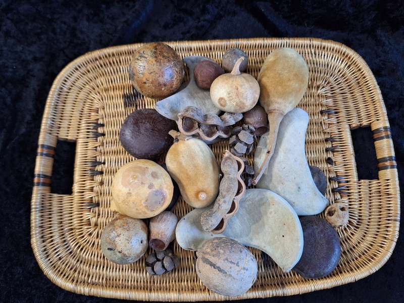 Vintage African Weaved Tray with Dried Fruits and Seeds.