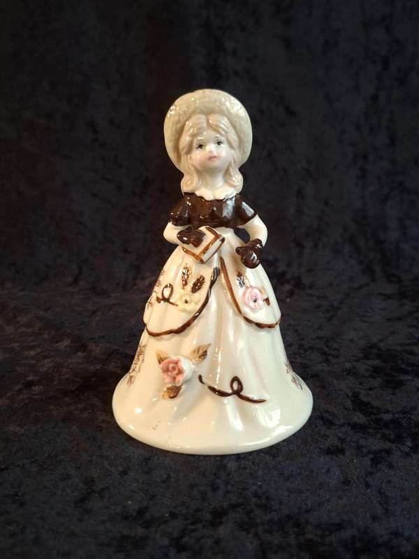 Beautiful Vintage Porcelain Bell Figurine.