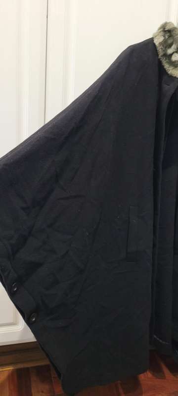 Cape coat with fur collar