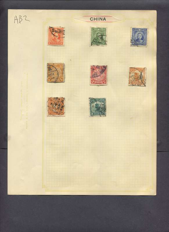 China - 8 Stamps Mounted On Old Album Page