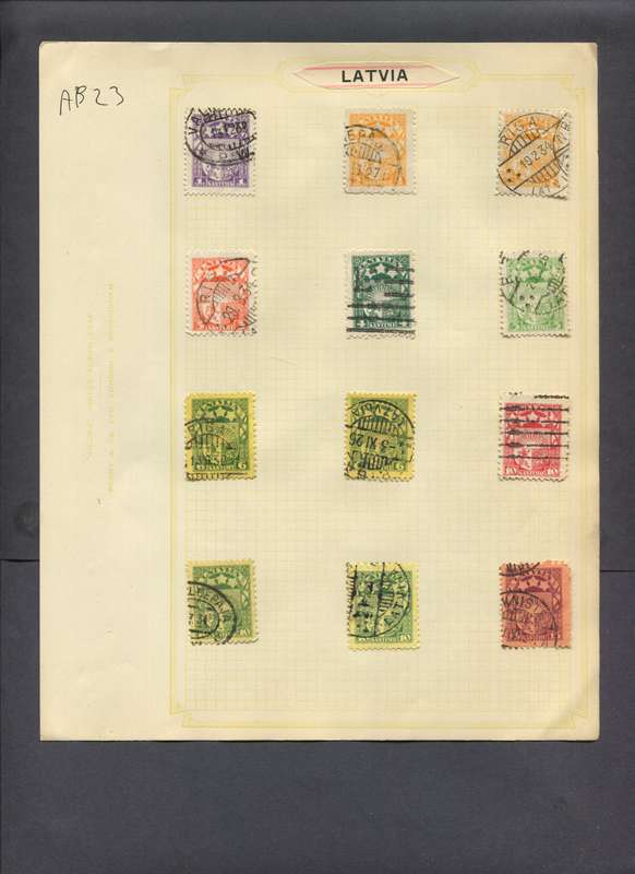Latvia - 12 Stamps Mounted On Old Album Page