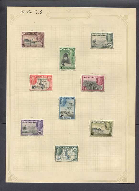 Nyasaland - 9 Stamps Mounted(Hinged) on Old Album Page