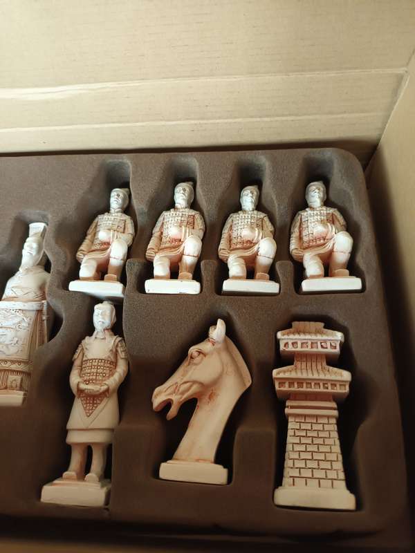 Detailed Oriental Chess Pieces with Fold Up Board
