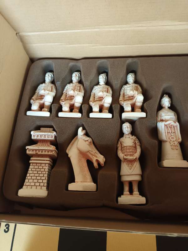Detailed Oriental Chess Pieces with Fold Up Board