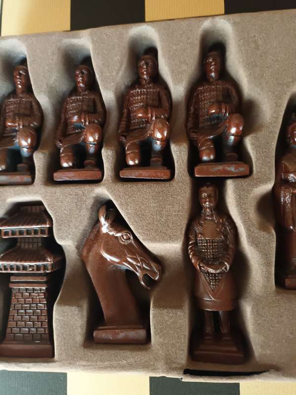Detailed Oriental Chess Pieces with Fold Up Board