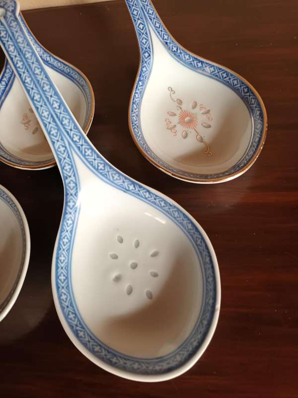 Four Oriental Ladels 23cm in length