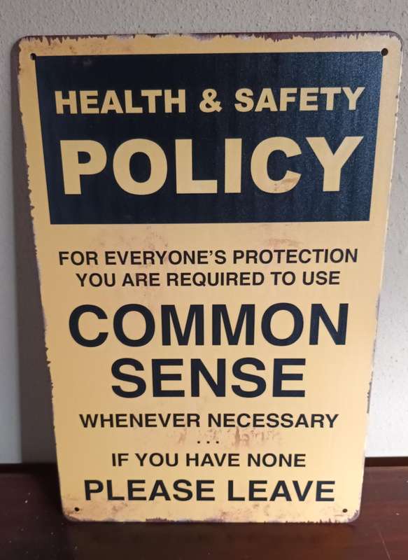 Tin Metal Sign - Common Sense