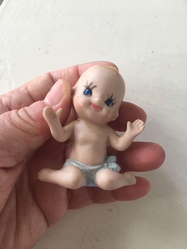 SMALL PORCELAIN KEWPIE DOLL