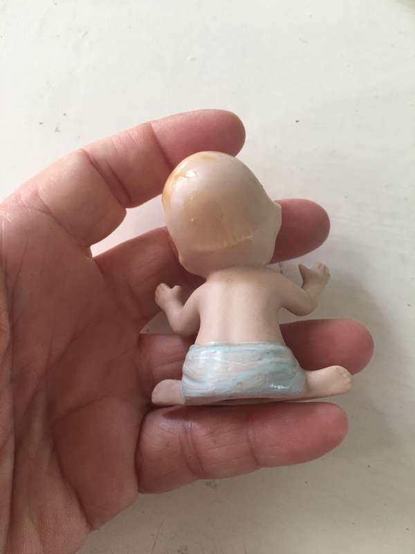 SMALL PORCELAIN KEWPIE DOLL