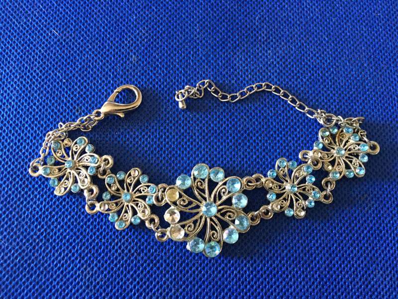 VINTAGE BRACELET  WITH FEW STONES MISSING