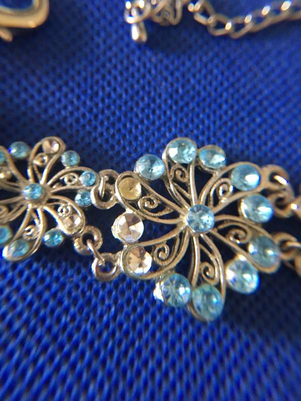VINTAGE BRACELET  WITH FEW STONES MISSING