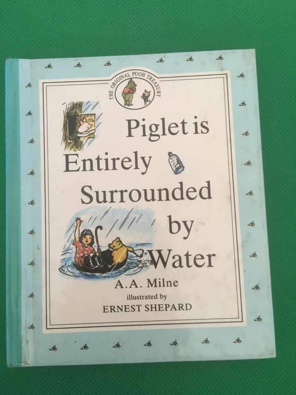 VINTAGE PIGLET IS ENTIRELY SURROUNDED BY WATER