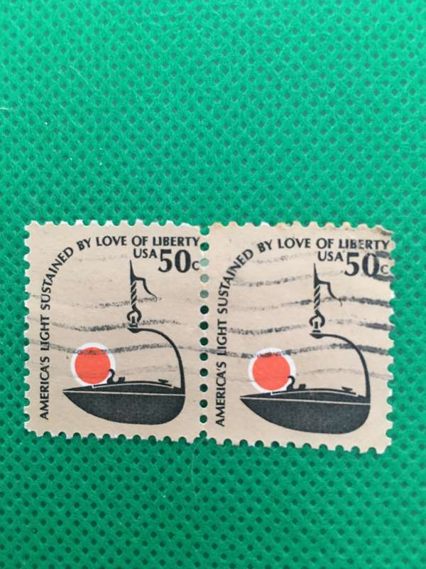 AMERICA PAIR OF USED STAMPS