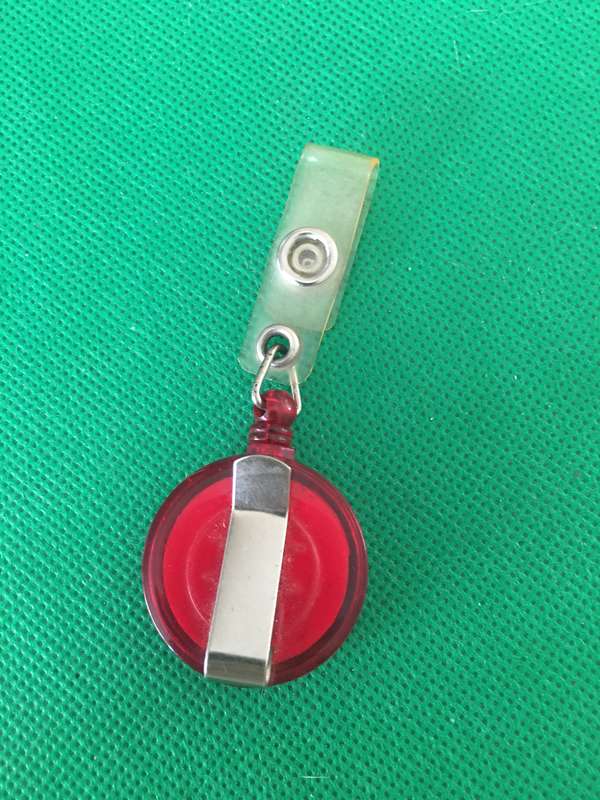 RETRACTABLE  BADGE HOLDER FOR WEARING ON THE BELT