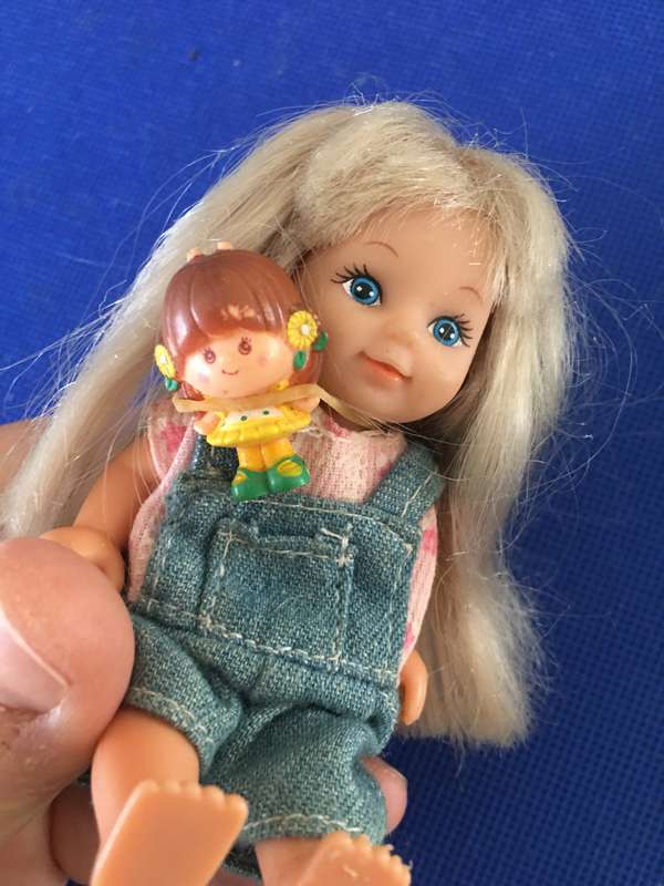 VINTAGE SMALL DOLL ON CHAIR WITH TINY DOLL - SIMBA