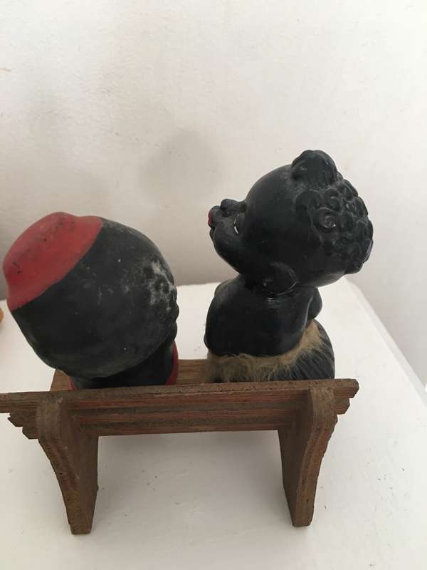 VINTAGE AFRICAN CHILDREN FIGURES ON BENCH  ONE REPAIRD