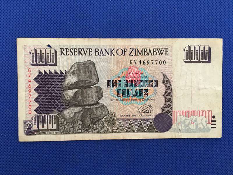 ZIMBABWE $100 DOLLARS BANK NOTE - 1995 - SERIAL NUMBER - GV 4697700