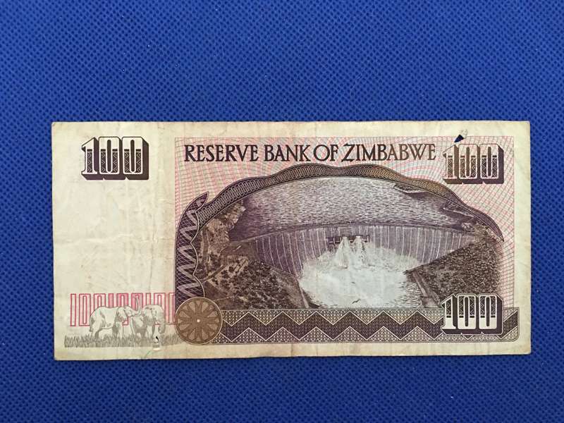 ZIMBABWE $100 DOLLARS BANK NOTE - 1995 - SERIAL NUMBER - GV 4697700