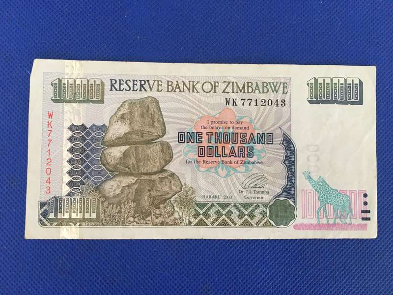 ZIMBABWE ONE THOUSAND DOLLARS BANK NOTE -  2003 - SERIAL NUMBER - WK 7712043