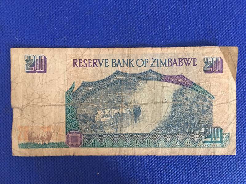 ZIMBABWE $20 DOLLARS - BANK NOTE WELL WORN - 1997 - SERIAL NUMBER / DR 9843075