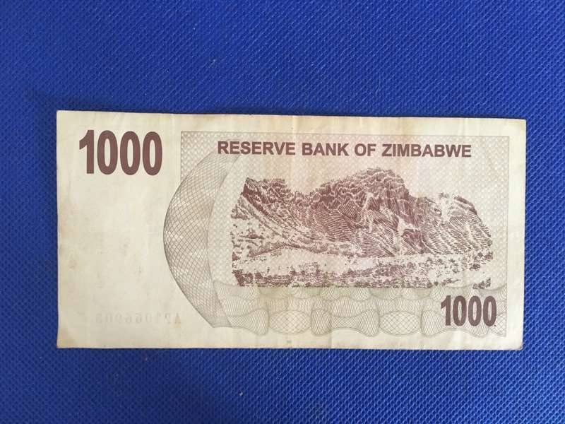 ZIMBABWE  ONE THOUSAND DOLLARS BANK NOTE BEARERS CHEQUE - 2007 SERIAL NUMBER - AP1066903