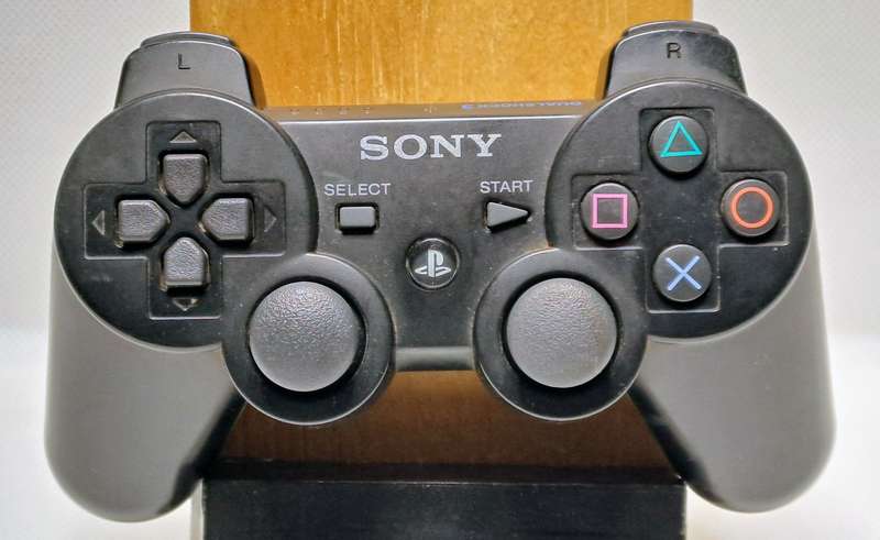 Sony PlayStation 3 / PS3 Super Slim Console with upgraded 250GB SSD and DualShock 3 Controller