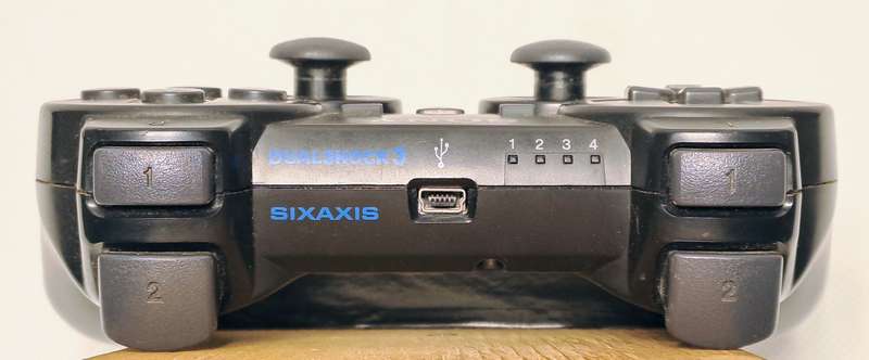 Sony PlayStation 3 / PS3 Super Slim Console with upgraded 250GB SSD and DualShock 3 Controller