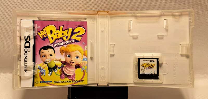 Nintendo DS Lite (Limited Edition Lime Green) handheld console with bundled games