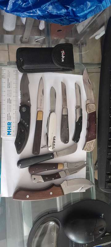 10 Pocket Knives.