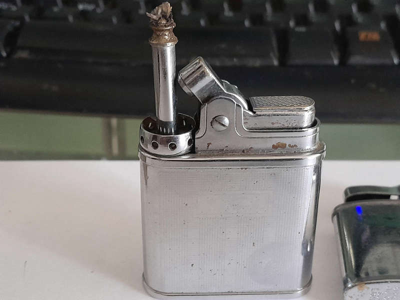 Full vintage pipe and cigarette lighters.benzyne
