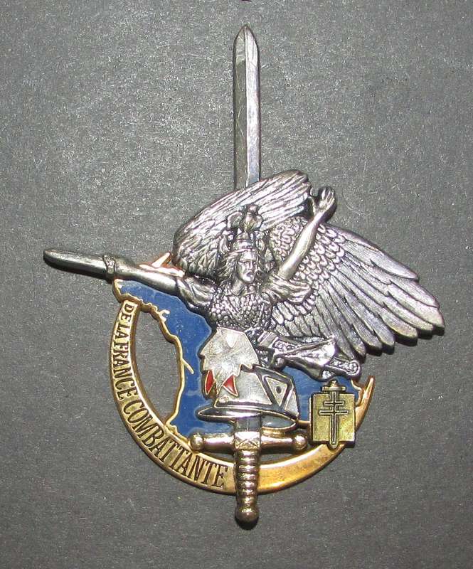 International - Cap Badge