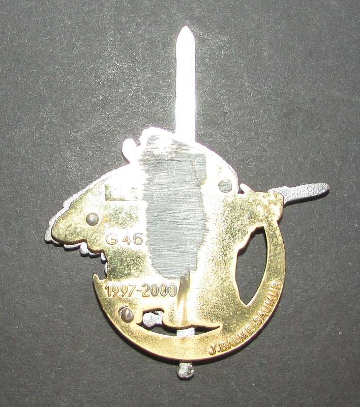 International - Cap Badge