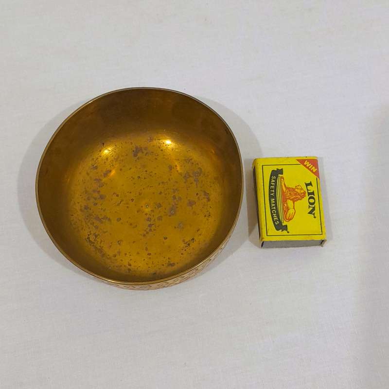 Beautiful and polished brass bowl with leaf and flower engraving