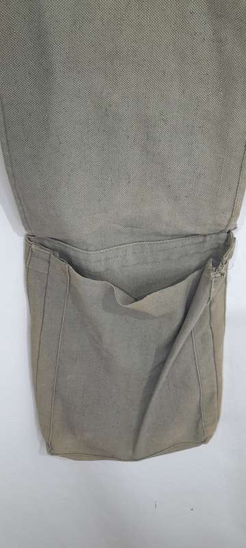 Vintage army sling bag with badge and patch detailing