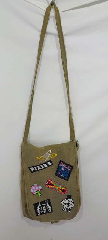Vintage army sling bag with badge and patch detailing