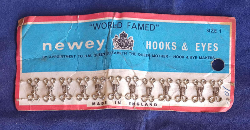 Vintage world famed Newey hooks & eyes